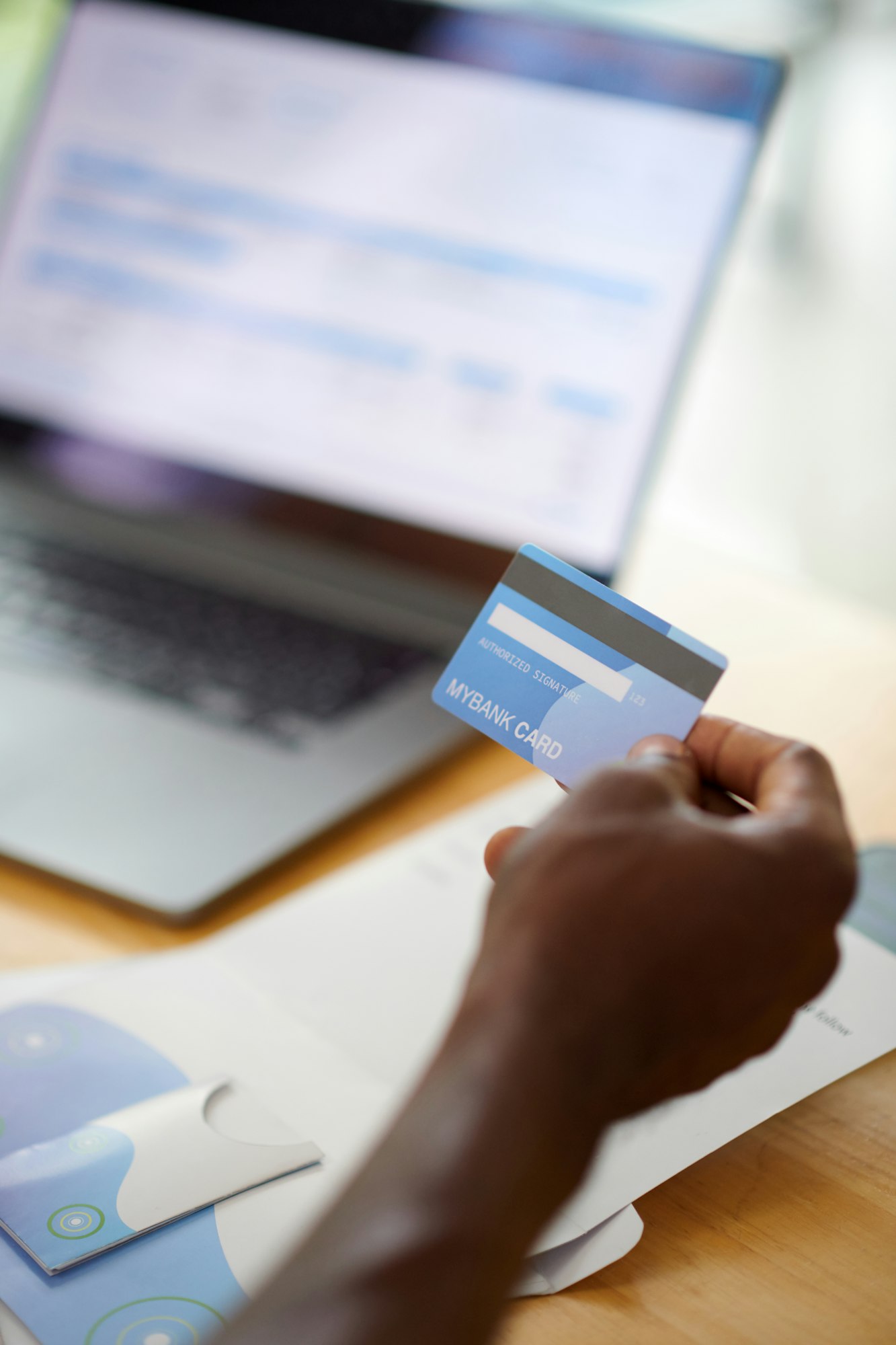 Man Paying with Card for Utility Bills